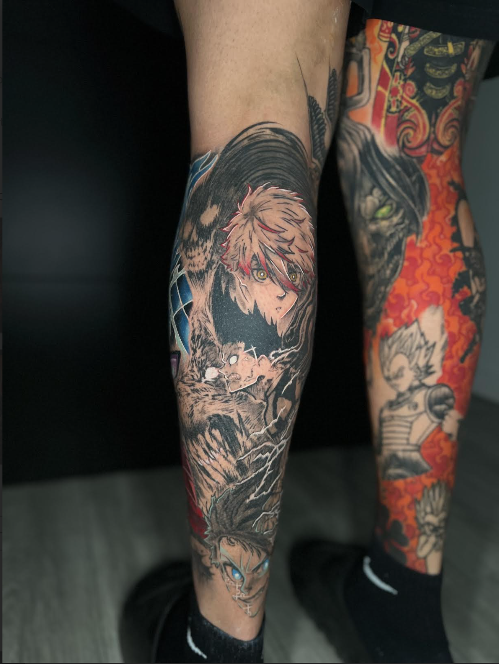 Full color leg sleeve with dense black and red shading