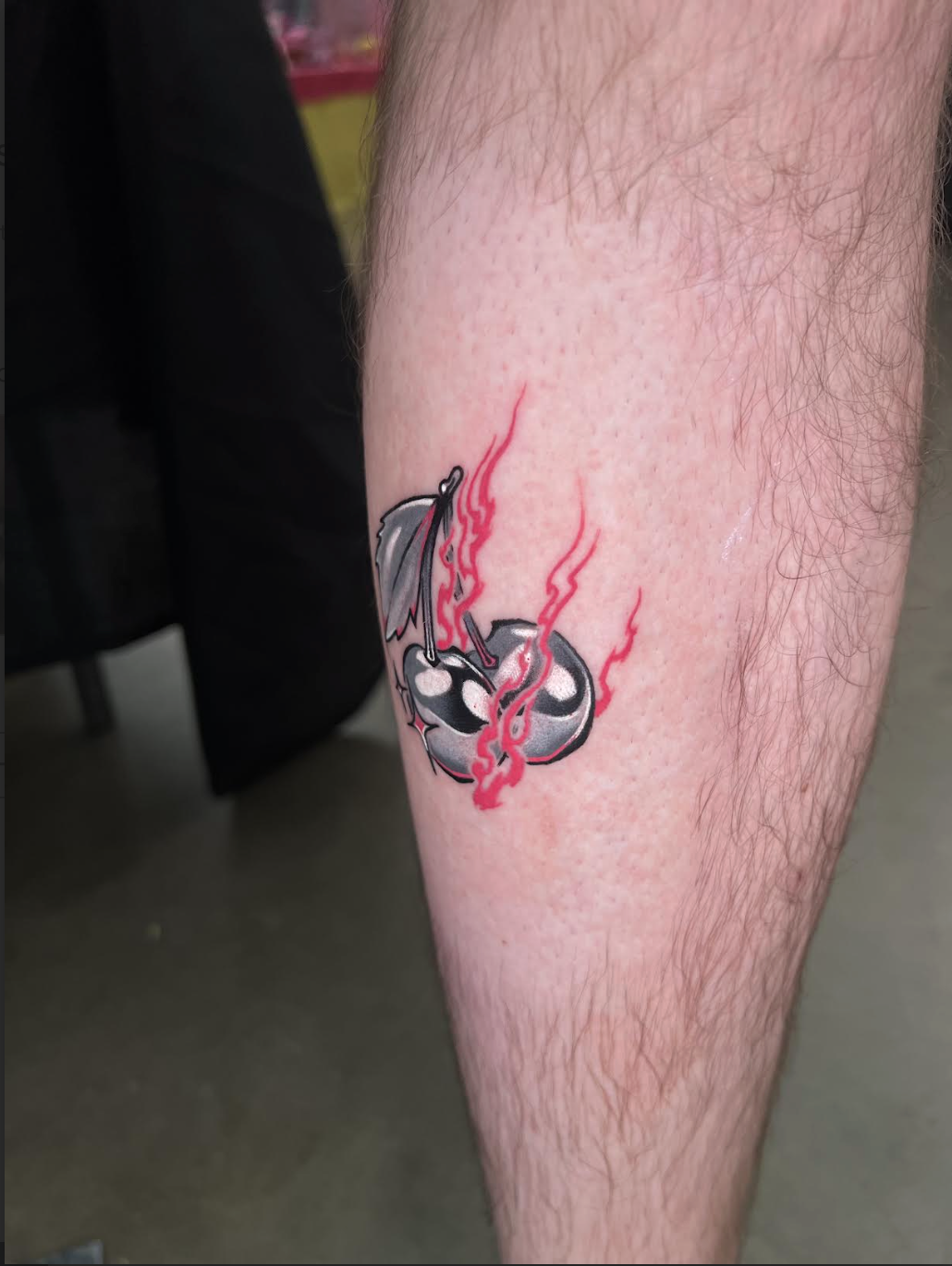 Chrome and red color tattoo with strong contrast
